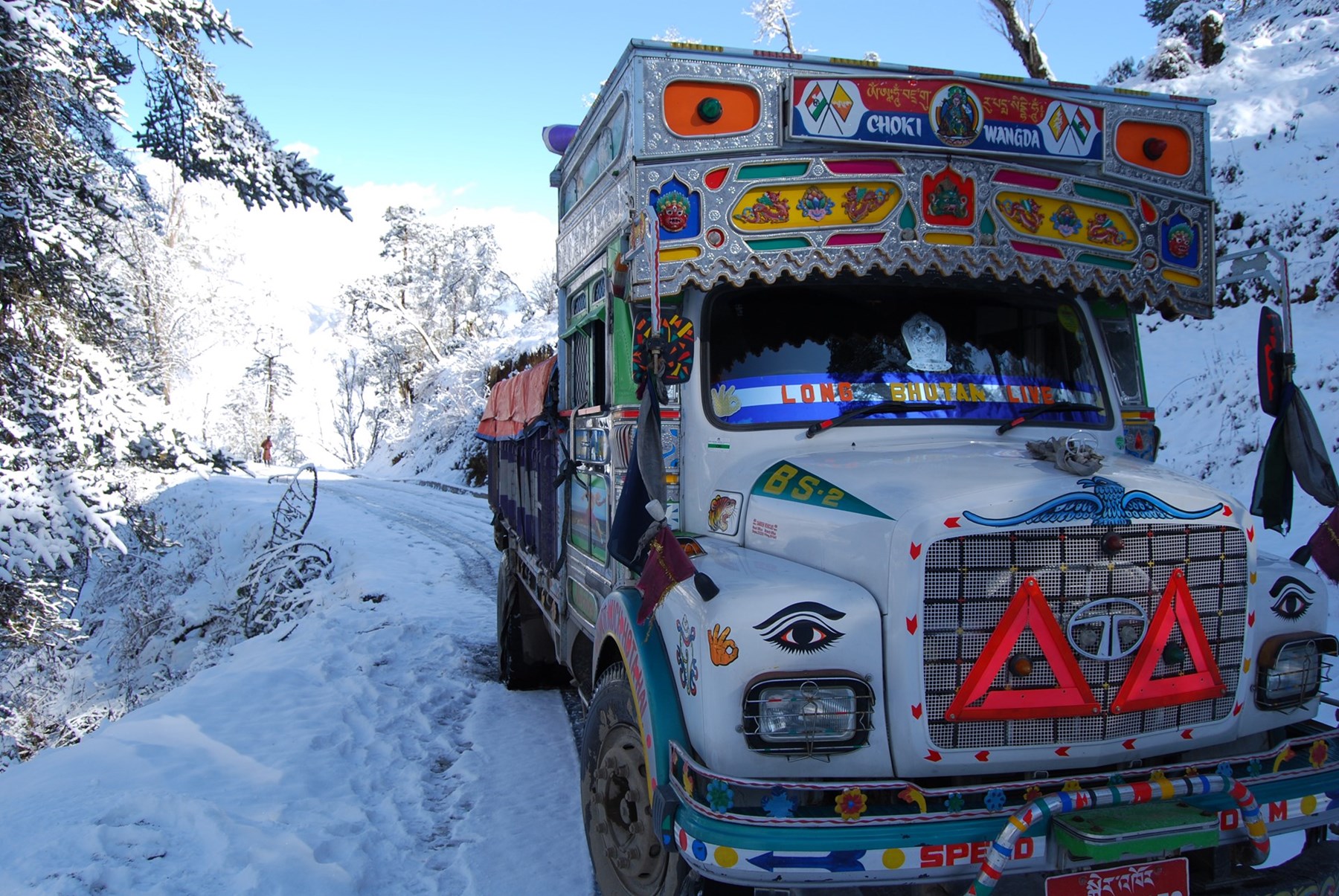 BHUTAN - Colourful truck in winter