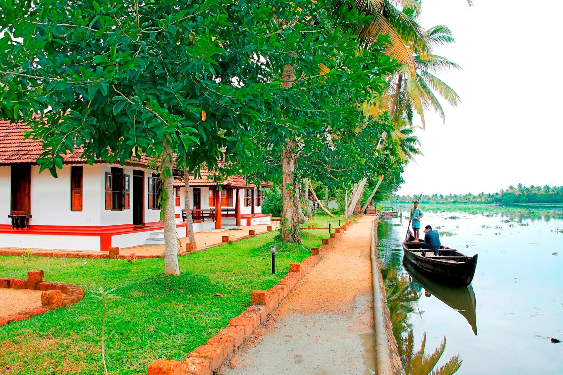 SOUTH INDIA - water-front view with private pool villas at Coconut Lagoon