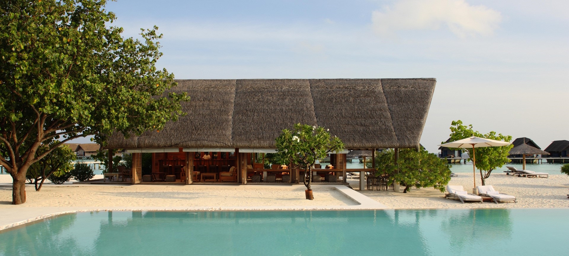 Stay in the Cocoa Island by COMO in the Maldives Ampersand Travel