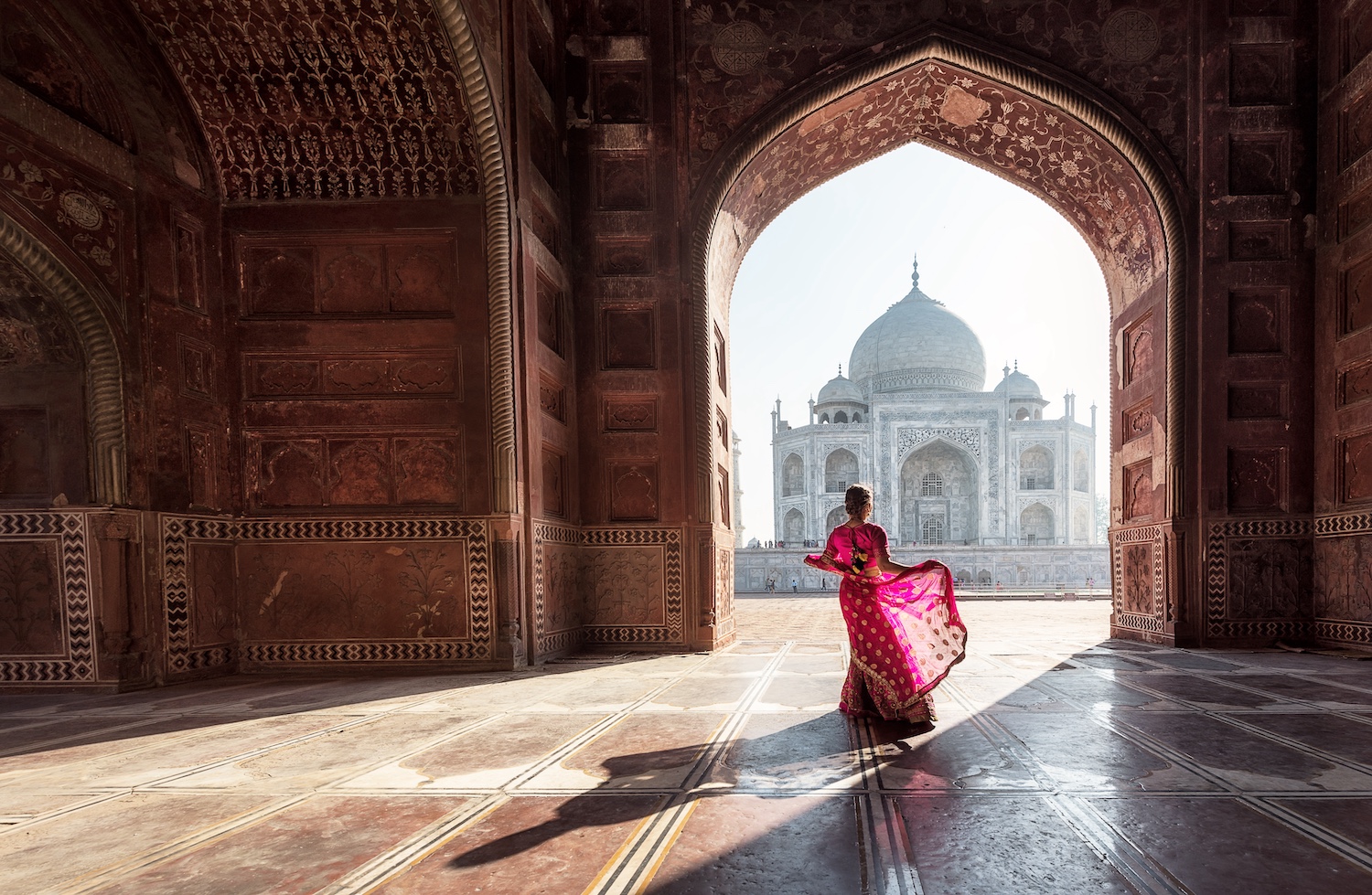NORTH INDIA Woman in sari at Taj Mahal, Agra.jpeg